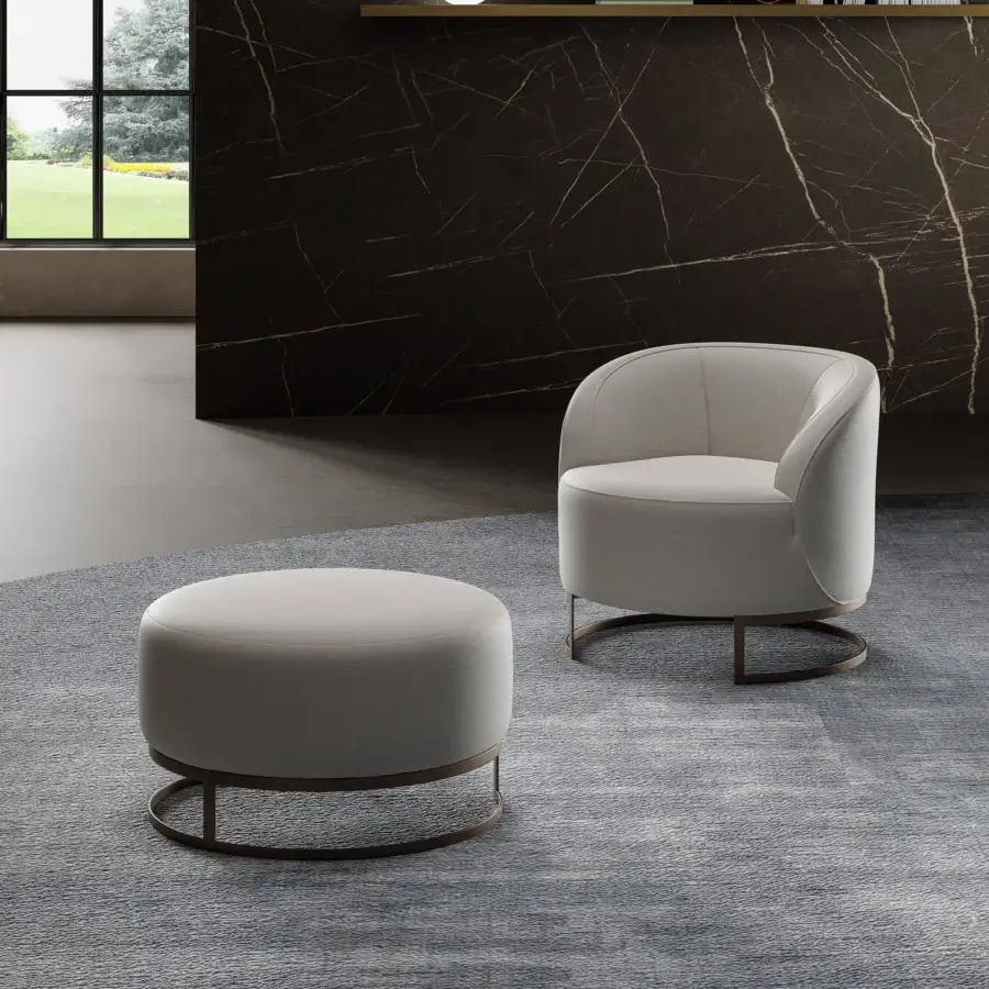 Distinguished Swan Italia Venus lounge chair with light gray textile upholstery and bronze-toned metal swivel base