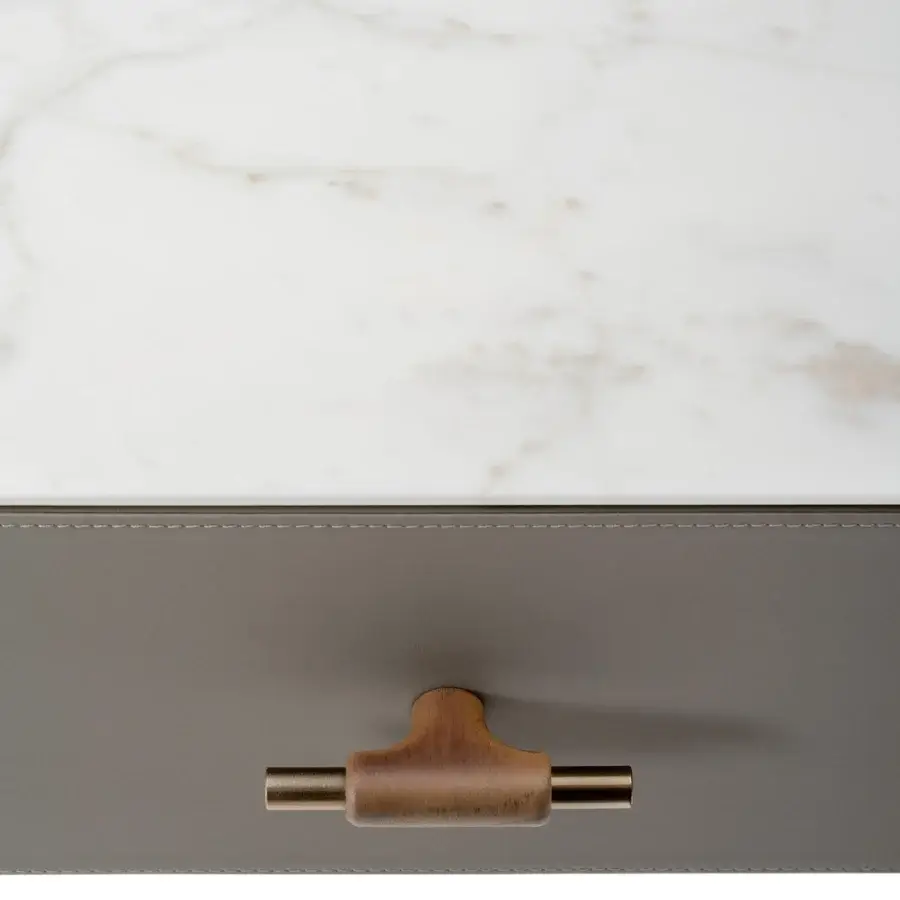 Superior Turri Blues vanity with walnut wood, gray drawer fronts and white marble top exhibiting beige veining