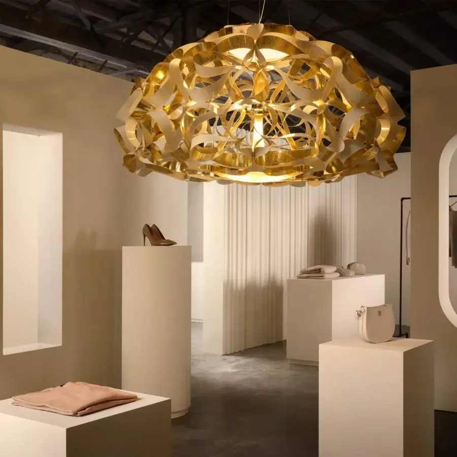 Superior Slamp Quantica suspension lamp with interwoven ribbons of Opalflex technopolymer and cold-applied gold foil finish