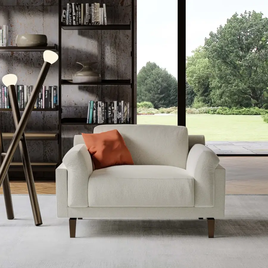Superior Swan Italia Berry lounge chair with light beige textured fabric and contrasting orange feather cushions crafted with a burnished metal frame