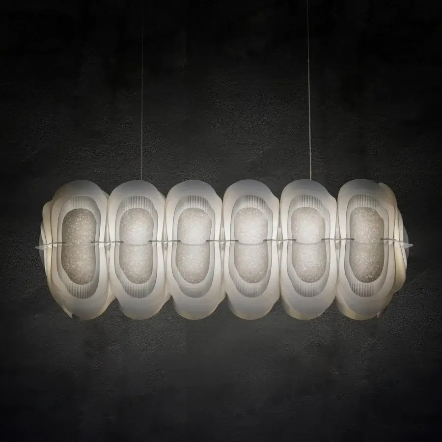 Distinguished Slamp Fiordlys linear suspension lamp crafted in white Opalflex with softly curved forms and delicate cables