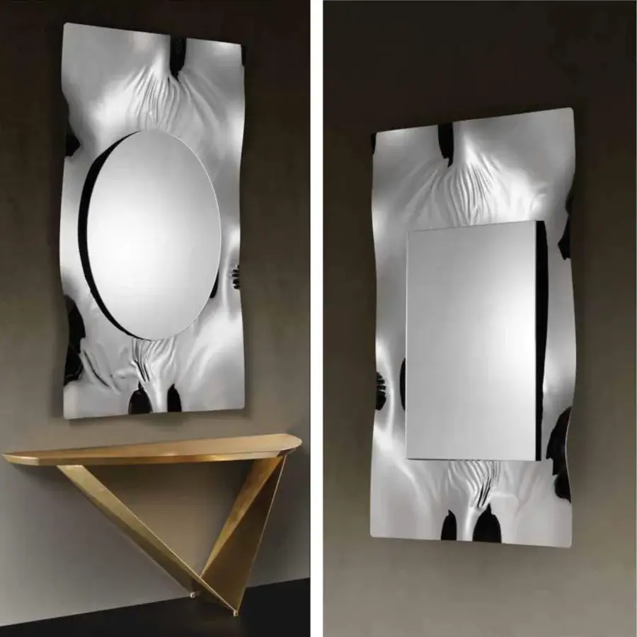 Exceptional Reflex Impact Supersilver mirror with organically shaped supermirror steel frame and extra-clear glass reflecting light