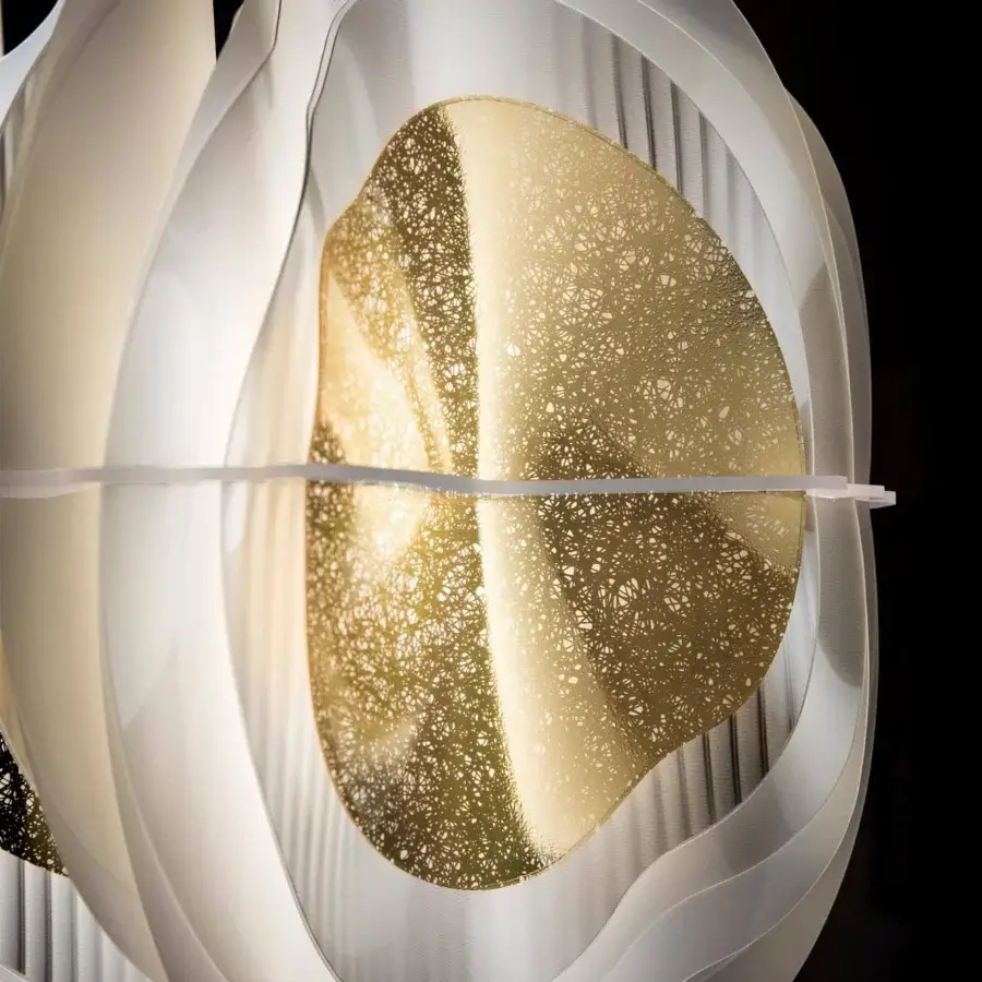 Captivating Slamp Fiordlys linear suspension lamp with soft white layered petals and gold-toned Opalflex interior