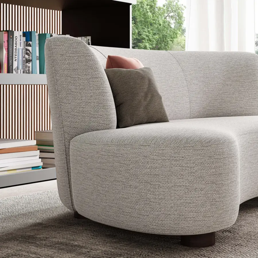 Captivating Swan Italia Venere sofa displays embracing rounded forms upholstered in light gray textile with wenge-stained wood feet and cushions