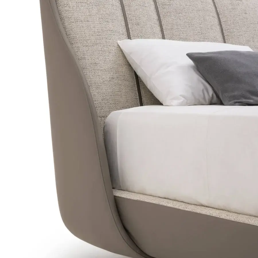 Exceptional Turri Blues bed presents fully padded construction with grey-taupe leather and textured textile upholstery