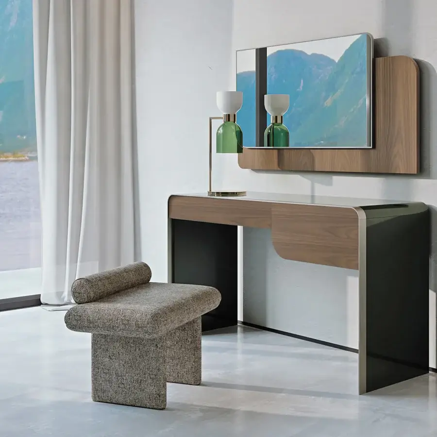 Distinguished Turri Soul mirror with walnut wood veneer and curved edges reflecting clear light