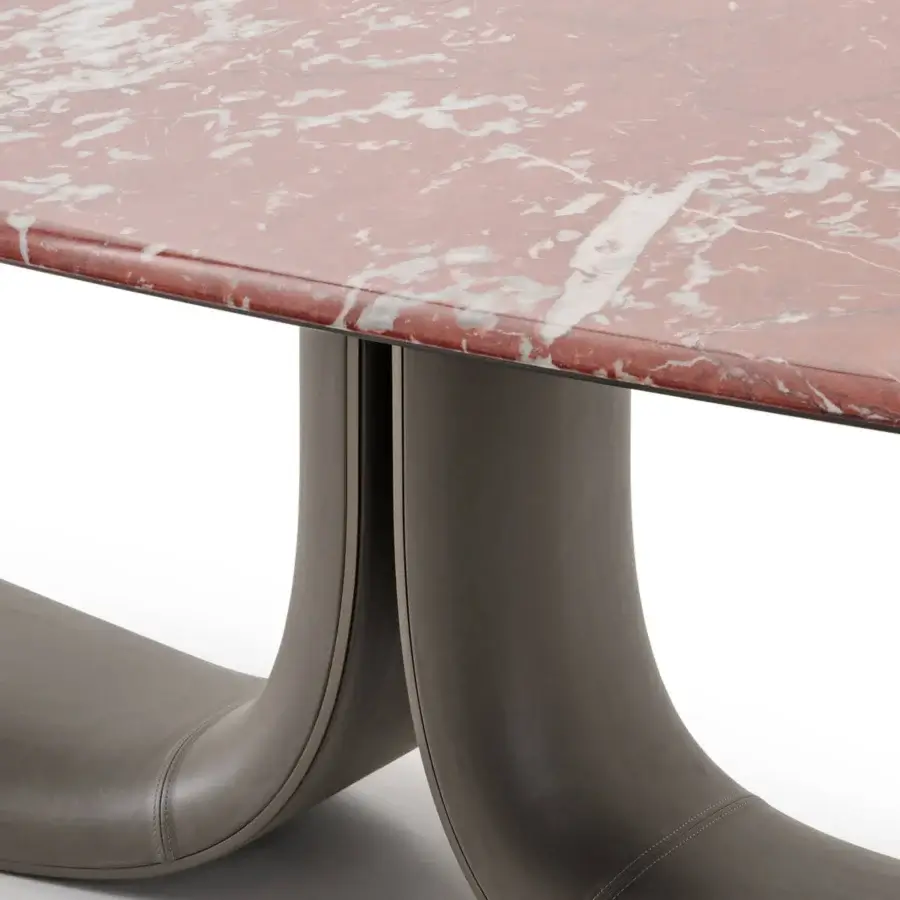 Superior Turri Soul table exhibits a serpentine leather leg with red-hued marble and smooth matte finish crafted in Italy