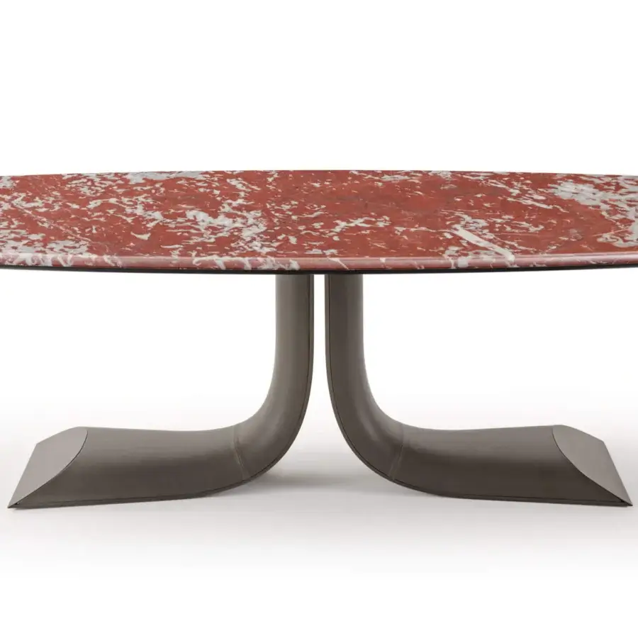 Elegant Turri Soul table exhibits a serpentine leather central leg with red and white marble top and smooth stone finish