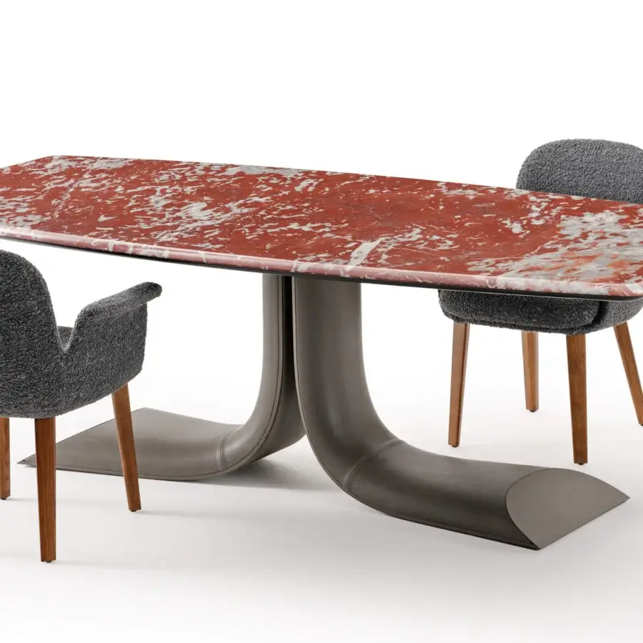 Distinguished Turri Soul table exhibits a serpentine leather base with a marble top in dynamic red and white patterns complemented by a smooth gray-brown finish