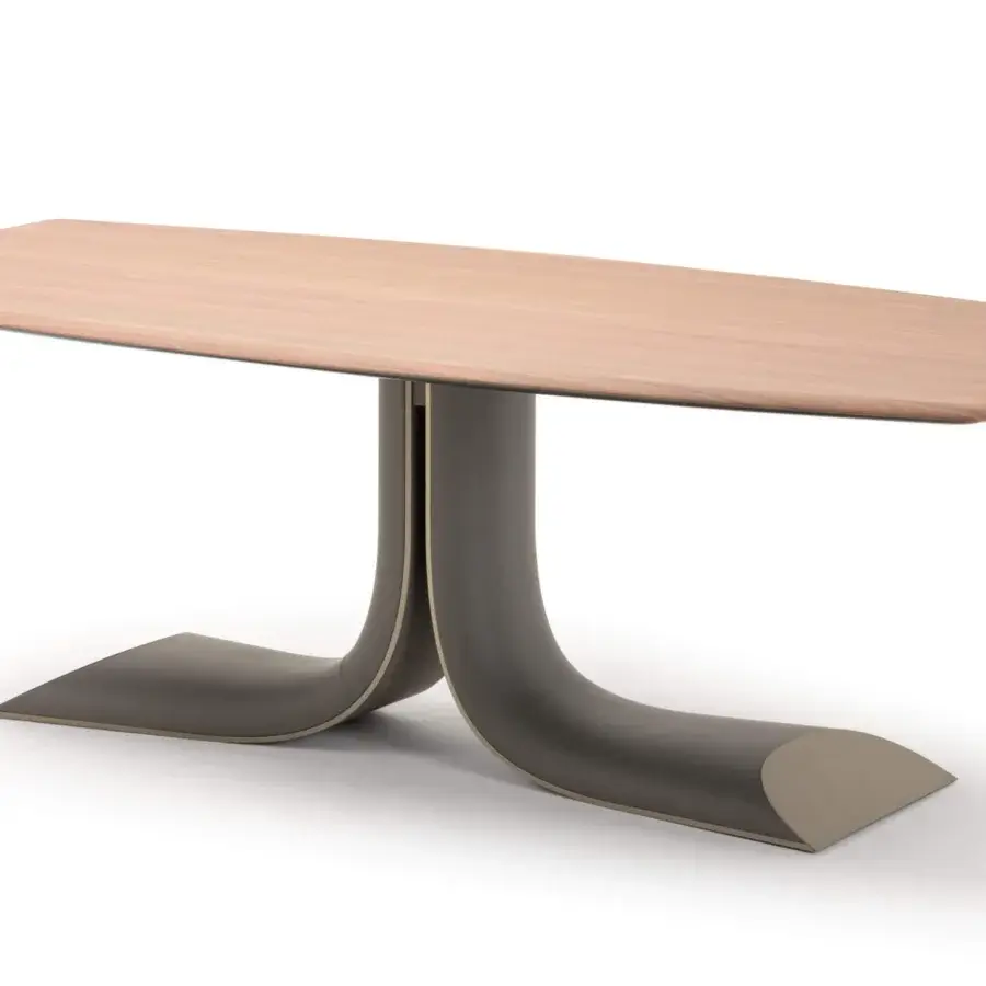 Distinguished Turri Soul table exhibits a light wooden top with a serpentine, darker leather-covered central leg and oblique cut base