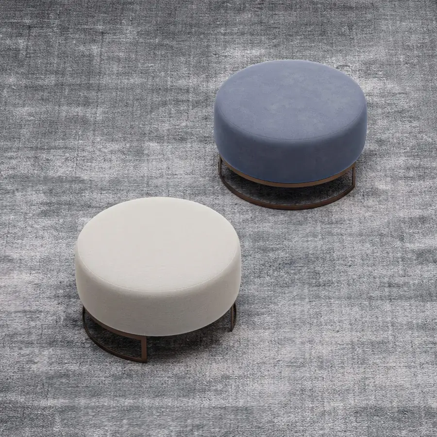 Sophisticated Swan Italia Venus ottoman showcases rounded volumes upholstered in removable muted blue fabric with gros-grain piping