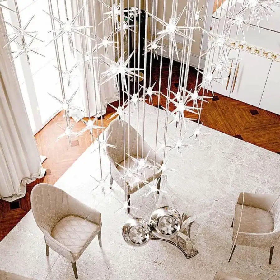 Captivating Reflex Stella suspension lamp with tiers of transparent Pyrex glass stars each holding a bulb within delicate wires