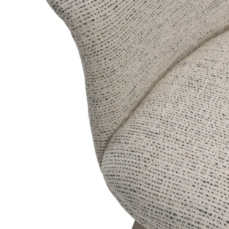 Distinguished Turri Soul armchair with ergonomic design upholstered in textured light beige fabric and sleek matte metal legs