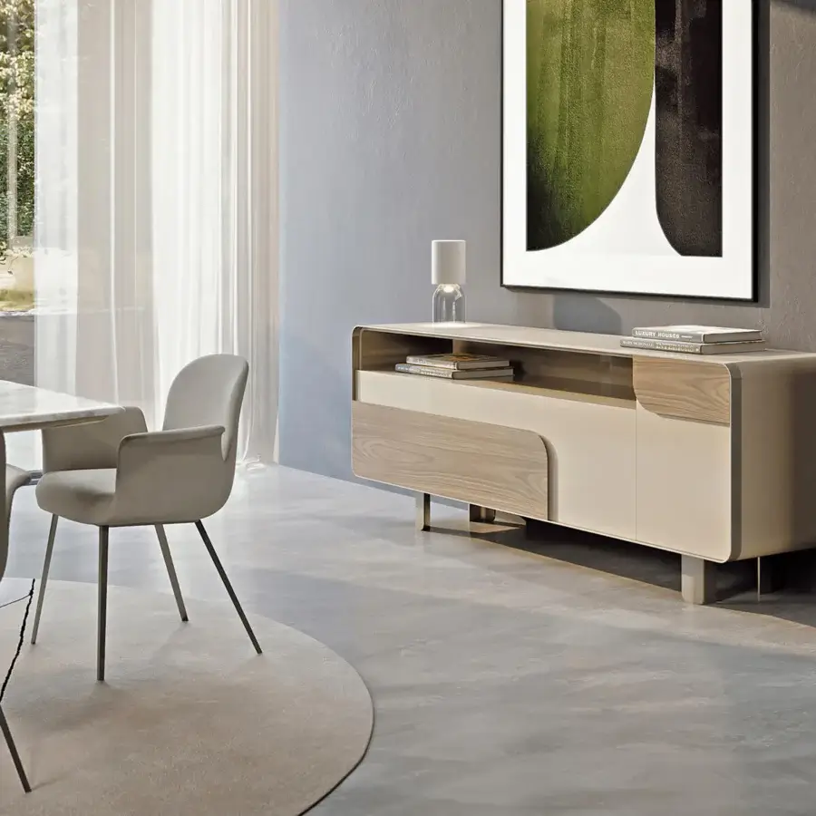 Distinguished Turri Soul sideboard with light cream finish, wood inserts and rounded metal frame supporting open and closed storage