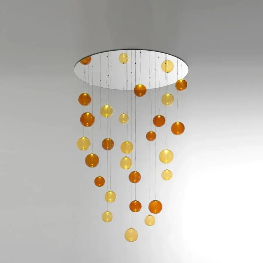 Exceptional Reflex Bulles suspension lamp with cascading clear and amber smooth borosilicate glass spheres and lacquered glass support