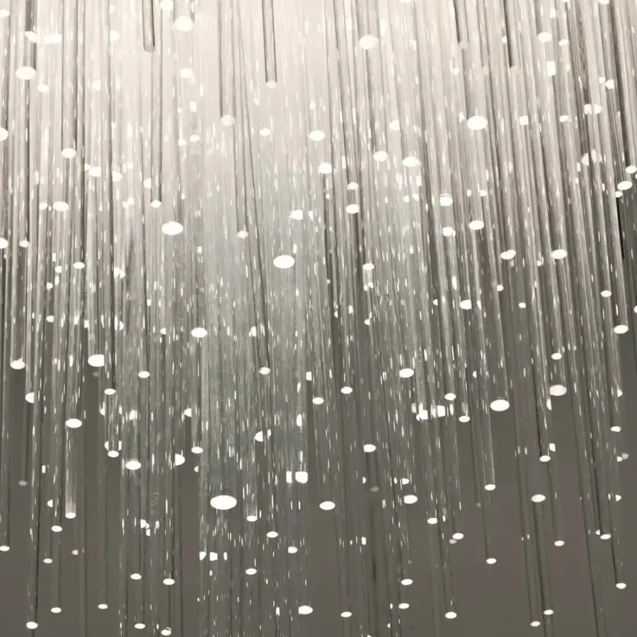Innovative Terzani Iceberg suspension lamp crafted in clear plexiglass with a transparent finish creating a cascading light effect