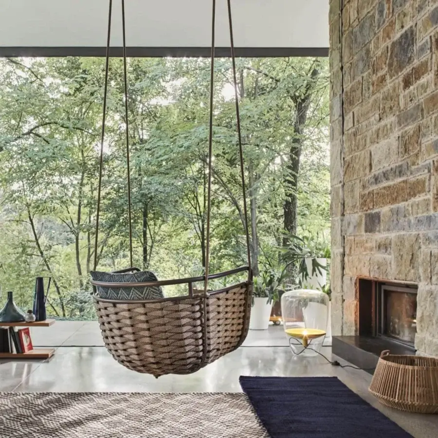 Distinguished Roberti Rattan Portofino swing crafted with aluminum and light brown Nautic Rope, including a patterned cushion