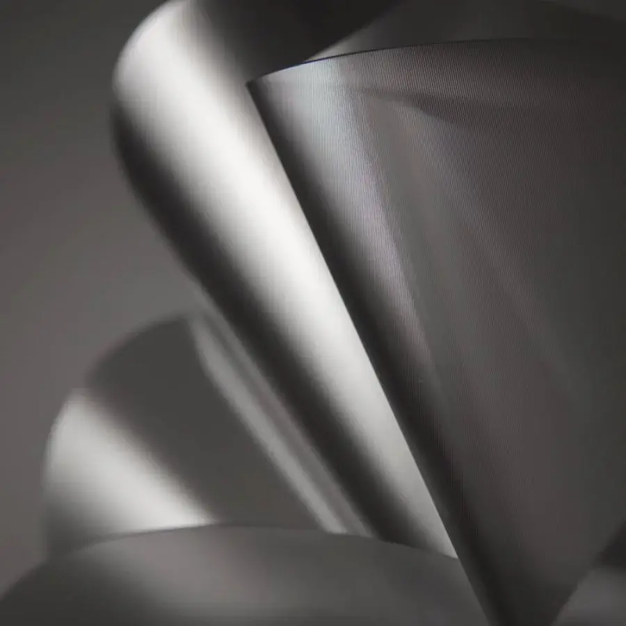 Distinguished Slamp Étoile lamp inspired by dance with cool gray Lentiflex® and dynamic curved form