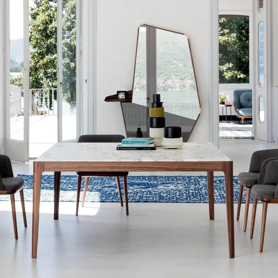 Exceptional Porada Celine armchair with dark gray textile upholstery and Canaletto walnut frame showcasing rich grain