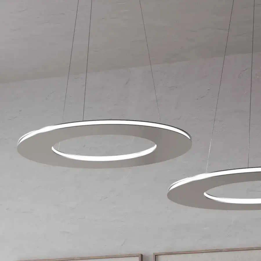 Superior Stillux Avalon suspension lamp with a circular steel structure and light gray finish diffusing warm light