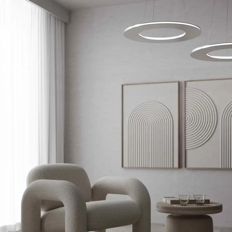 Elegant Stillux Avalon suspension lamp with a circular steel form and matte white finish creating a soft glow