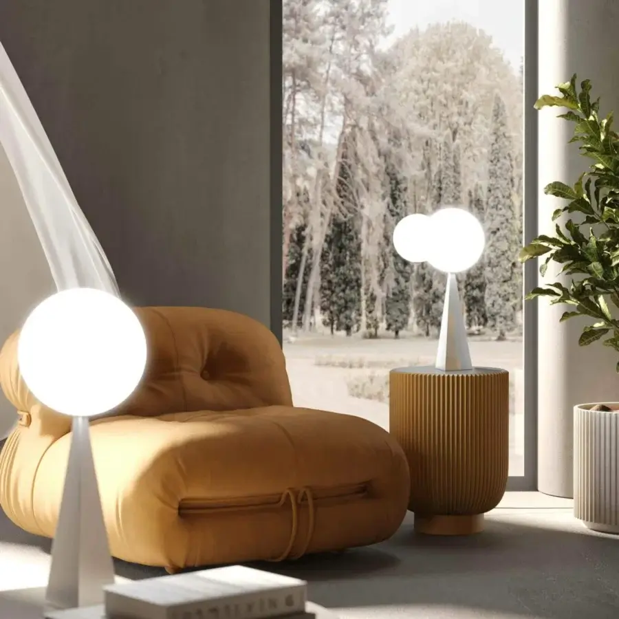 Superior Stillux Glo table lamp with pyramid steel base and luminous white handmade blown glass lampshade with smooth matte finish