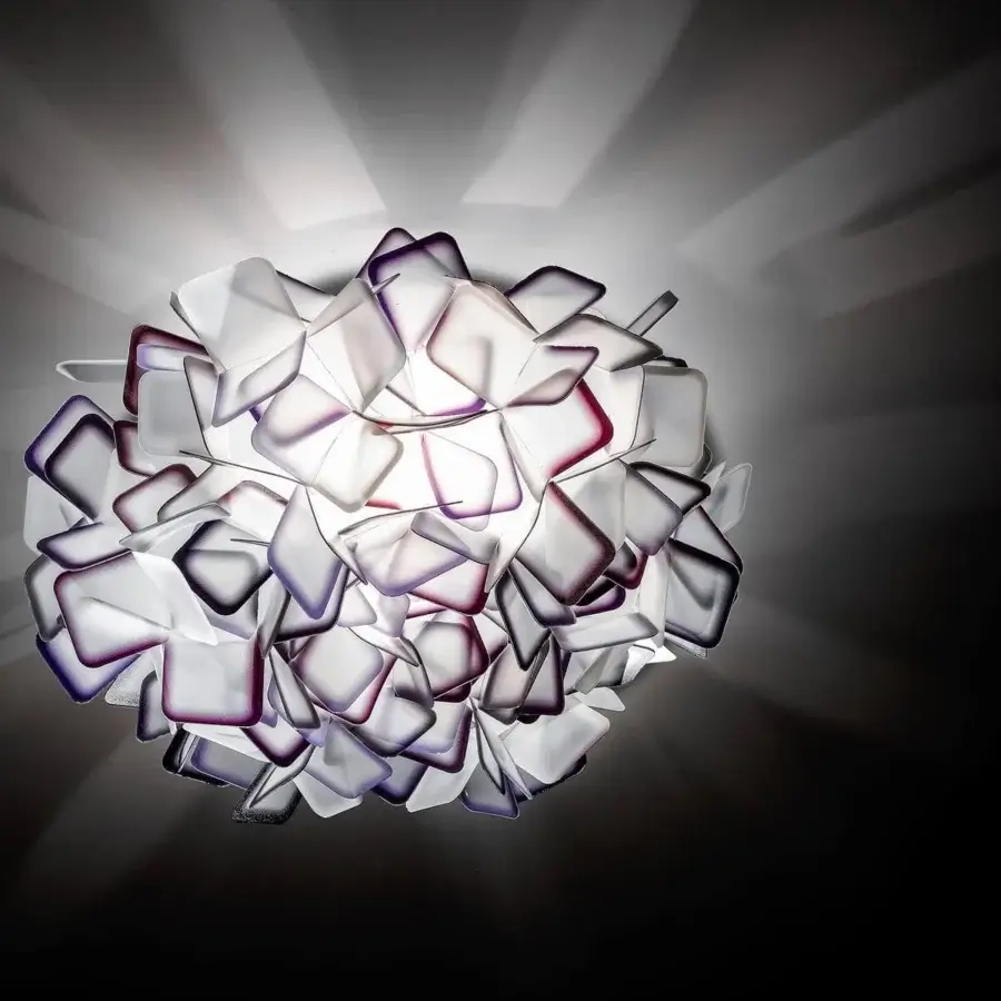 Distinguished Slamp Clizia ceiling/wall lamp crafted in white Opalflex® with a subtle purple outline and intricate texture