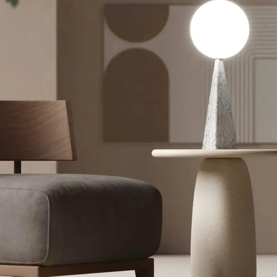 Distinguished Stillux Glo table lamp with pyramid hammered steel base and refined handmade blown glass lampshade in mottled gray and white