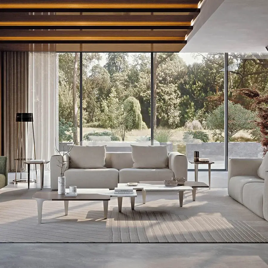 Lavish Turri Soul coffee table with light metal legs and a composite top showcasing dark brown wood with off-white marble