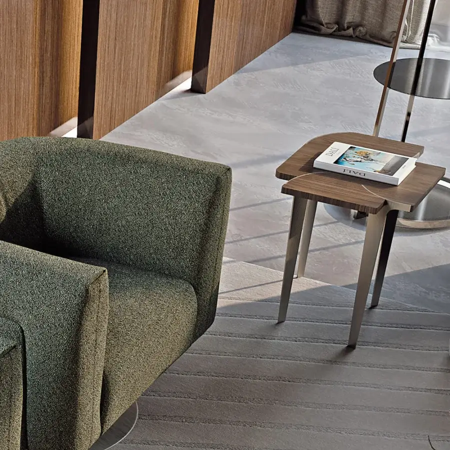 Elegant Turri Soul side table with a flower-shaped wood top and light metal legs in a medium-toned brown finish