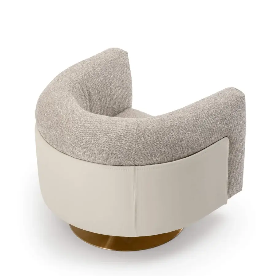Distinguished Turri Soul lounge chair with curved silhouette in light beige textured fabric and light cream synthetic material with glossy golden metal base