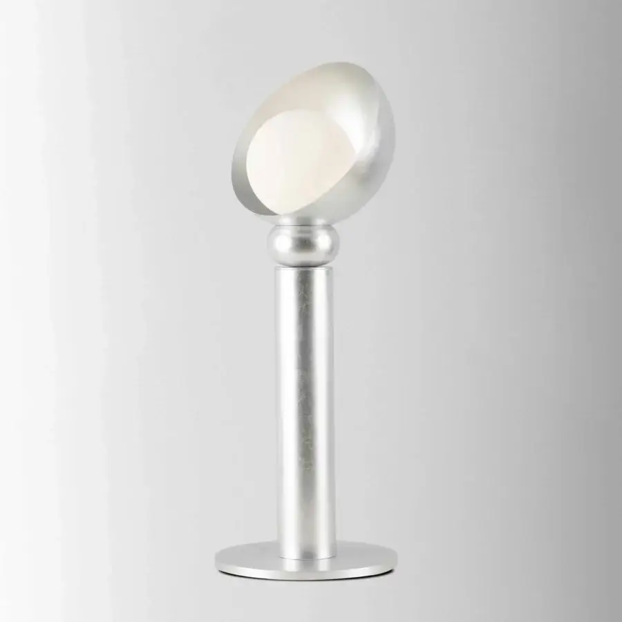 Elegant Stillux Helo table lamp with a silver finish and handmade matt white blown glass sphere enveloped in silver leaf metal