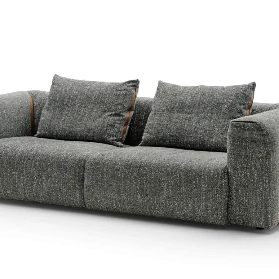 Elegant Turri Soul sofa built in textured gray textile with stylish brown leather-like panels and precious inserts