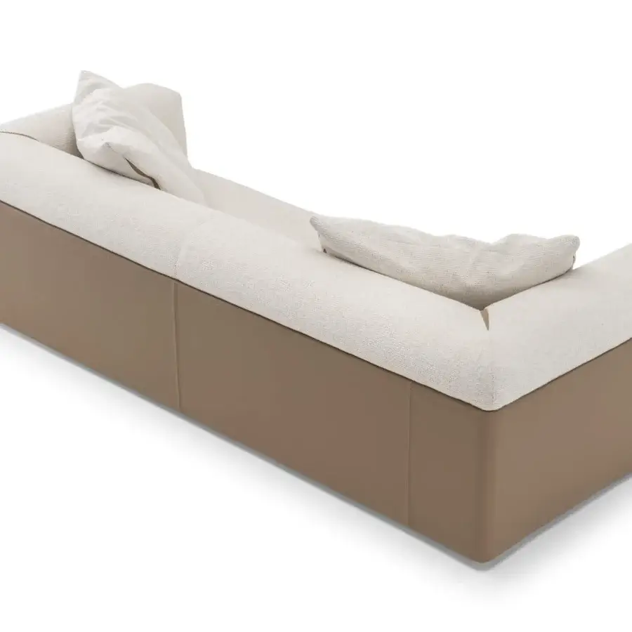 Superior Turri Soul sofa built with tan panels framing light beige textile seating and precious inserts with a matte finish
