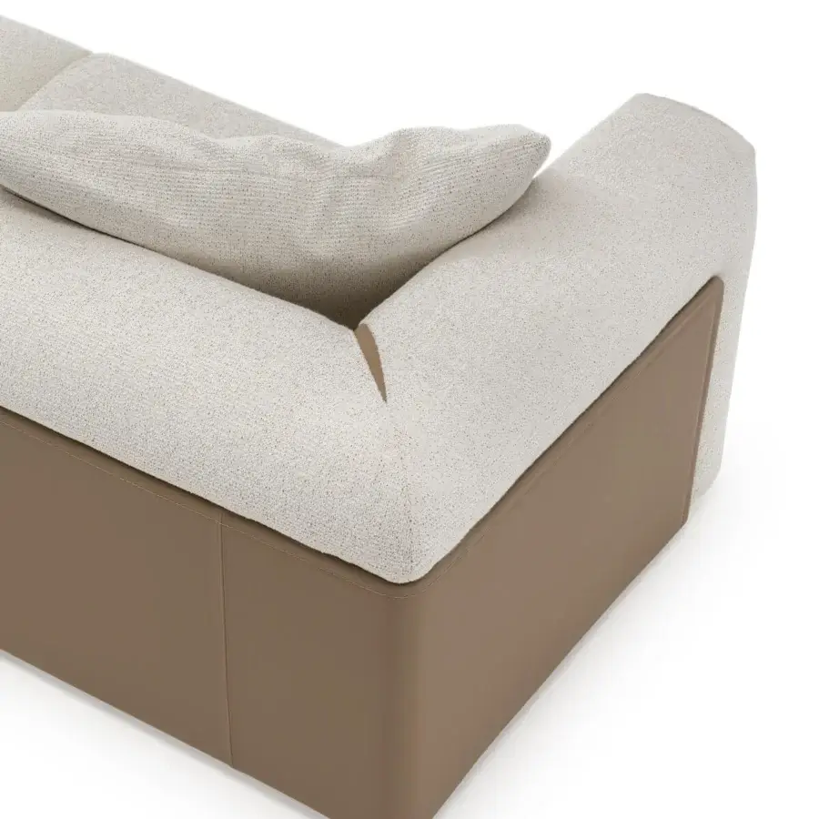 Distinguished Turri Soul sofa crafted with light beige textured textile and precious light brown inserts framing a low-profile geometric silhouette