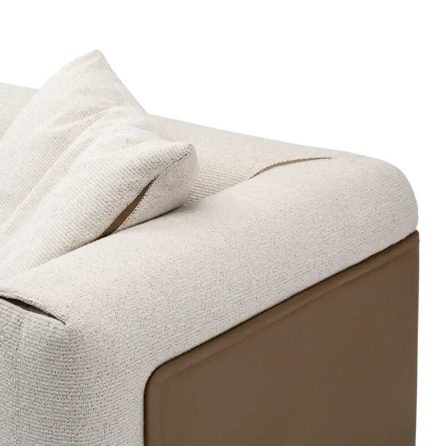 Lavish Turri Soul sofa presents stylish panels framing a curved silhouette in light beige textile with a smooth medium brown base and precious inserts