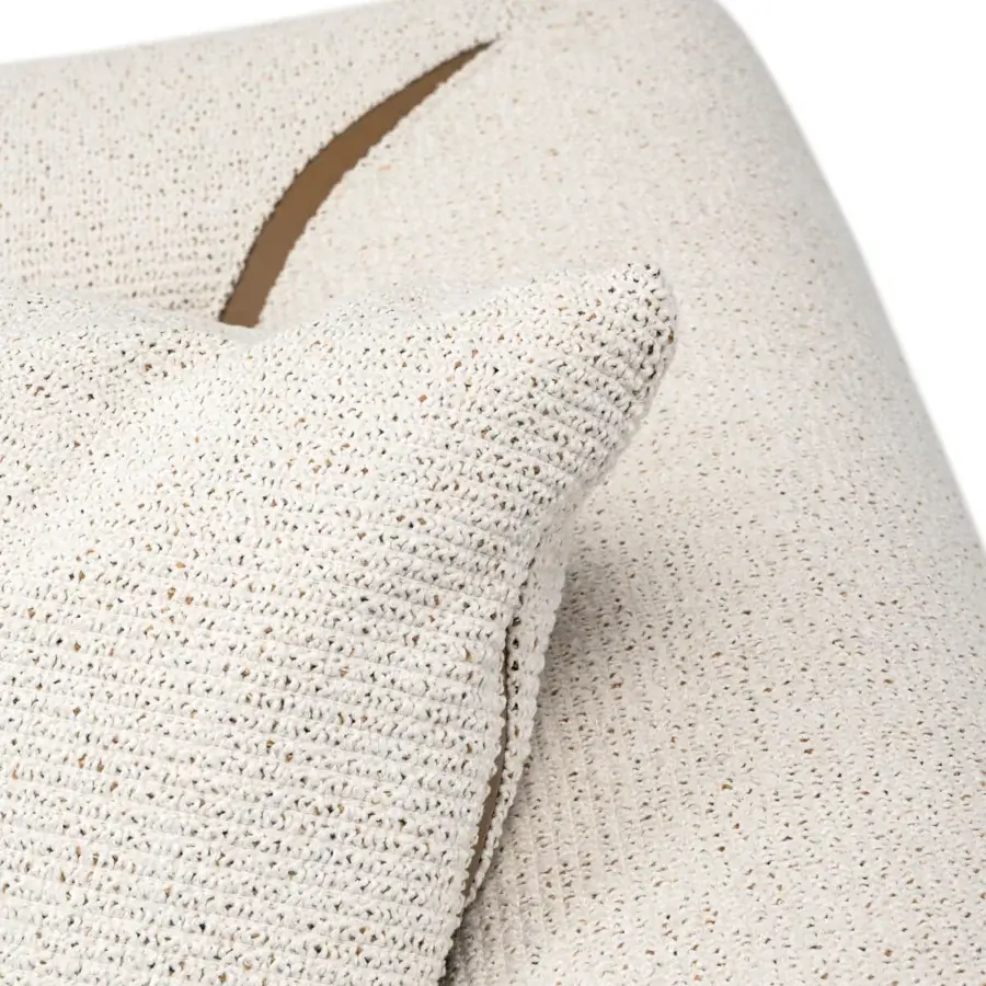 Exceptional Turri Soul sofa built with textured off-white woven textile and precious inserts highlighting a curved form with contrasting brown accents