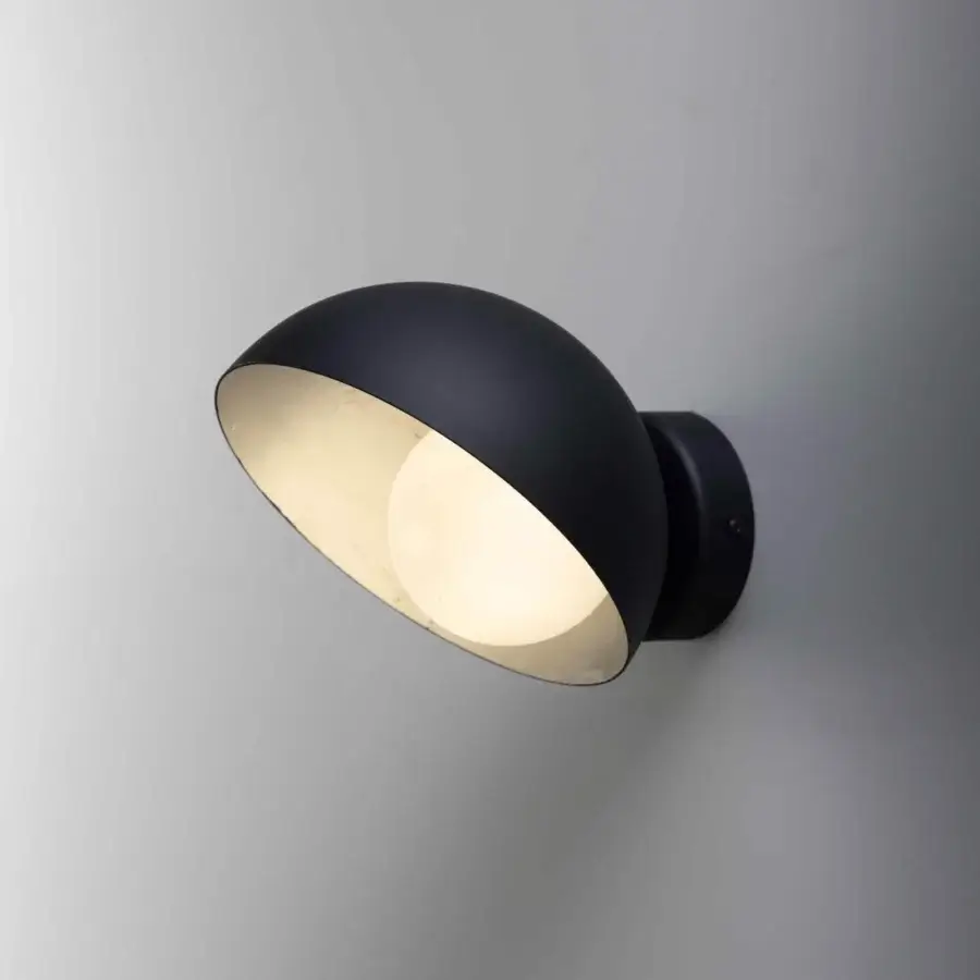 Elegant Stillux Helo wall lamp with handmade matt white blown glass enveloped in matte black metal with gold leaf interior