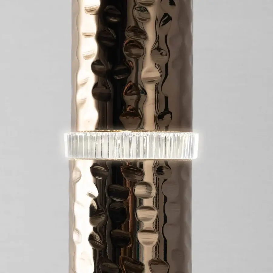 Elegant Stillux Shadows floor lamp with hammered metal structure and transparent crystal detailing in bronze or champagne-gold tone