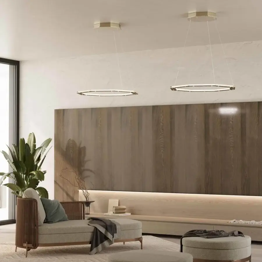 Innovative Stillux Otto suspension lamp with octagonal ring built from hammered metal in a matte golden tone