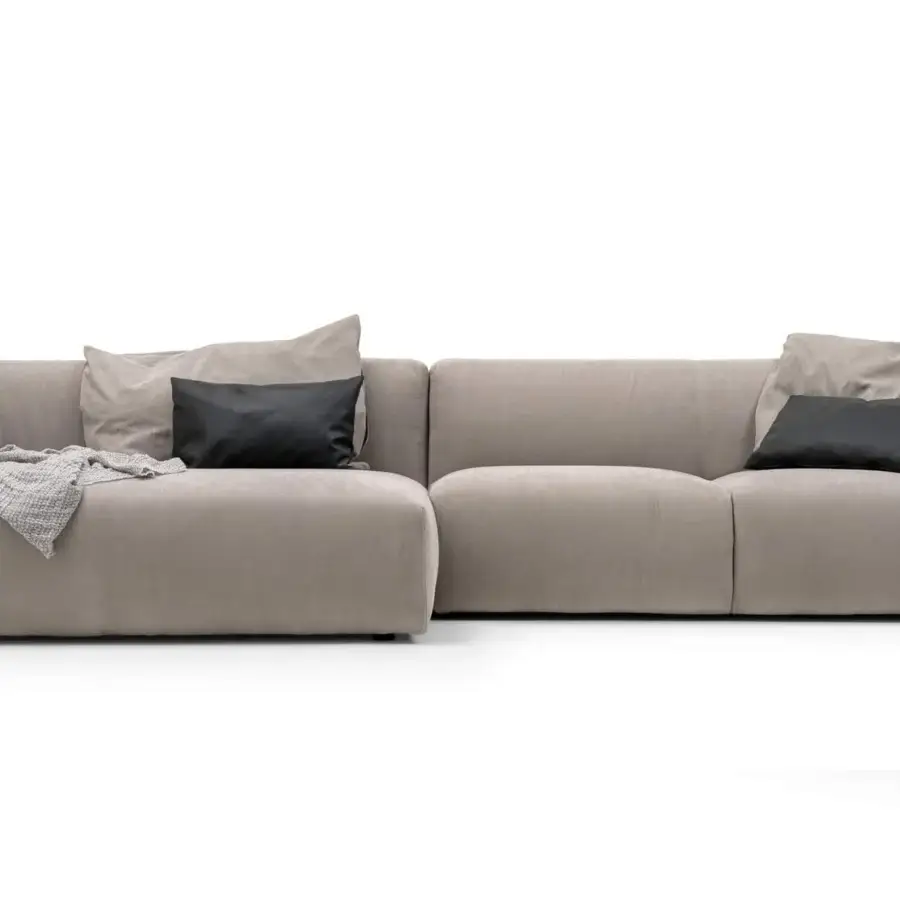 Superior Turri Soul sectional with light brown textile upholstery and distinctive leather inserts in a matte finish