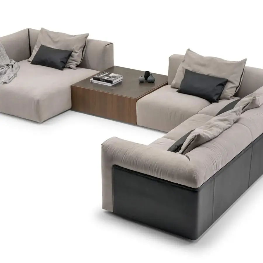 Exceptional Turri Soul sectional with light beige textile upholstery, dark gray base panels and leather armrest inserts