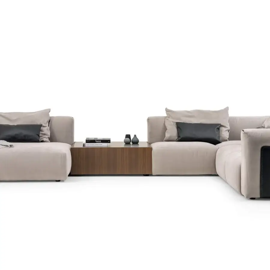 Distinguished Turri Soul sectional with light beige textile upholstery, precious leather inserts and dark panels
