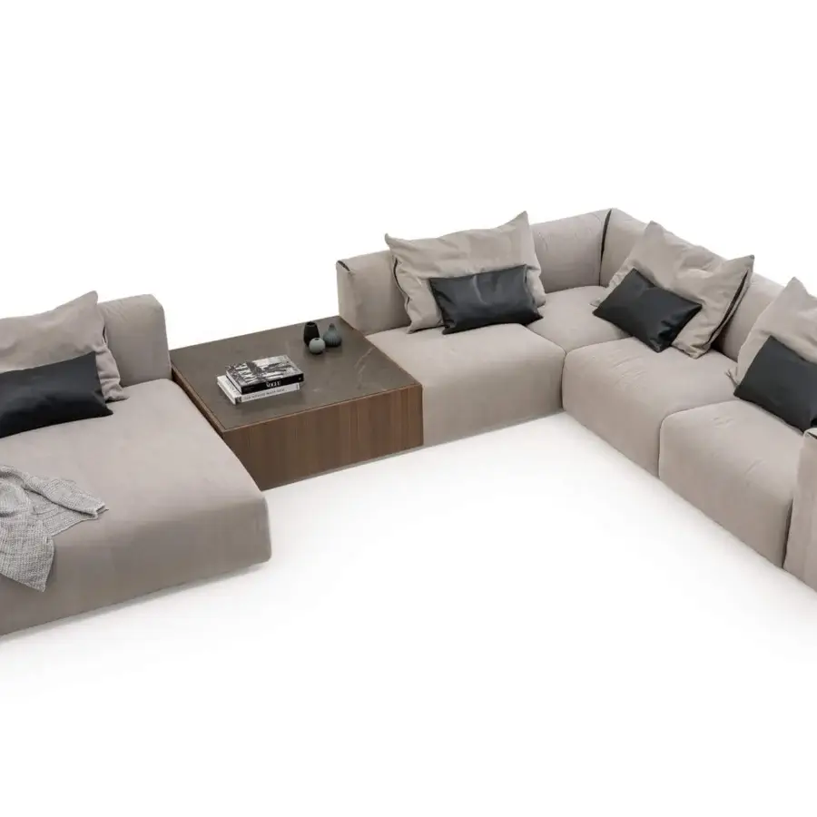 Lavish Turri Soul sectional with light gray textile upholstery, precious leather inserts and wooden coffee table