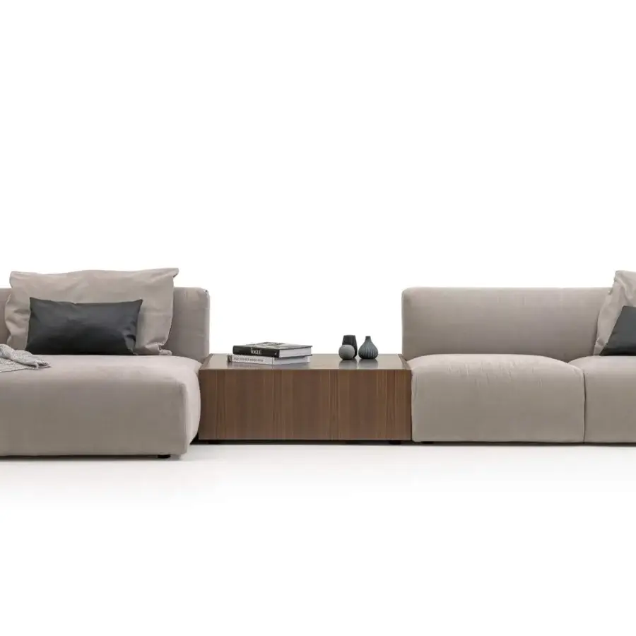 Superior Turri Soul sectional with light gray textile upholstery, precious leather inserts and a wooden base