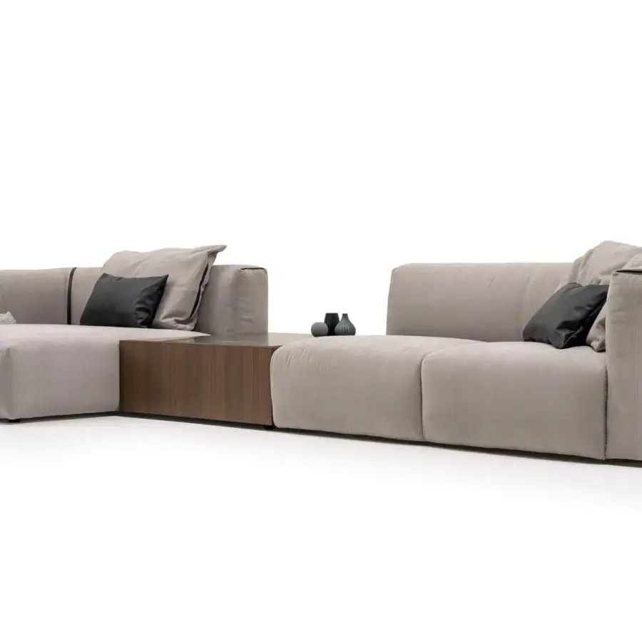 Distinctive Turri Soul sectional with light gray textile upholstery, dark brown wooden side table and leather inserts
