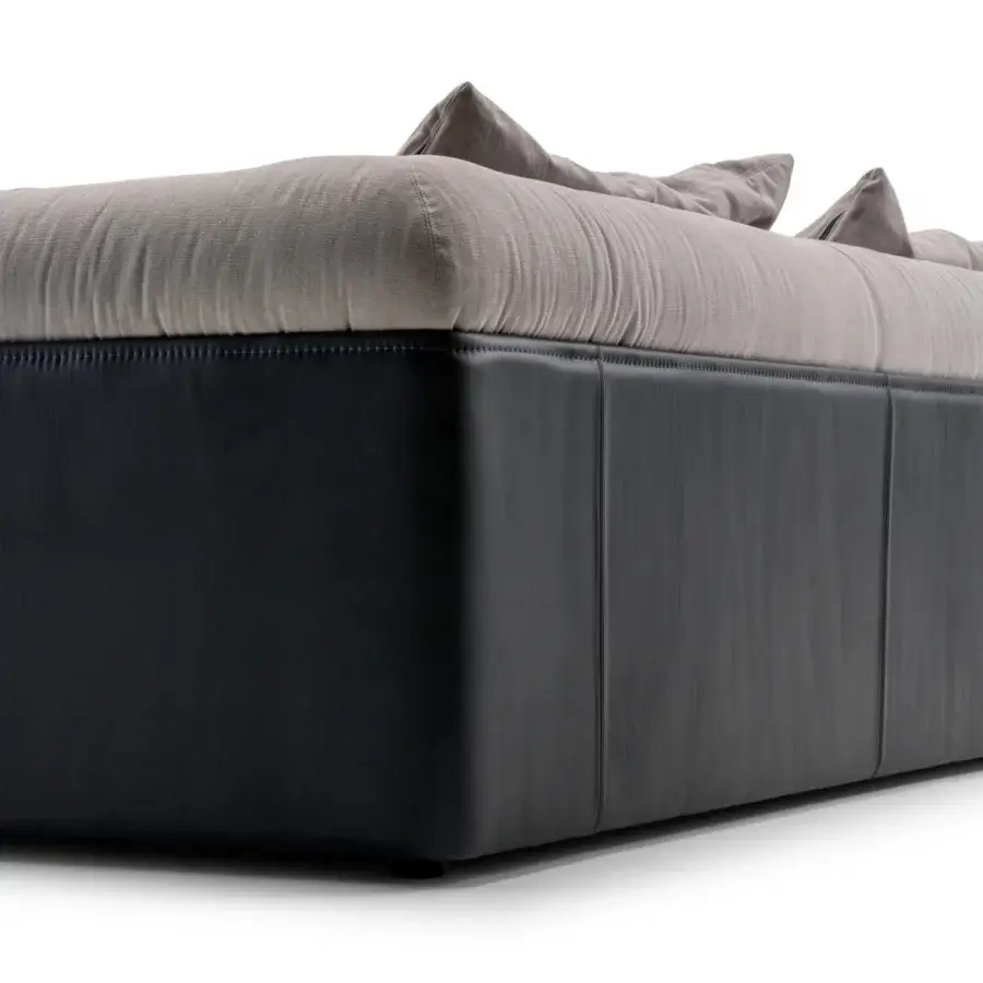 Superior Turri Soul sectional with light gray ribbed textile and dark gray synthetic upholstery, crafted with precious leather accents