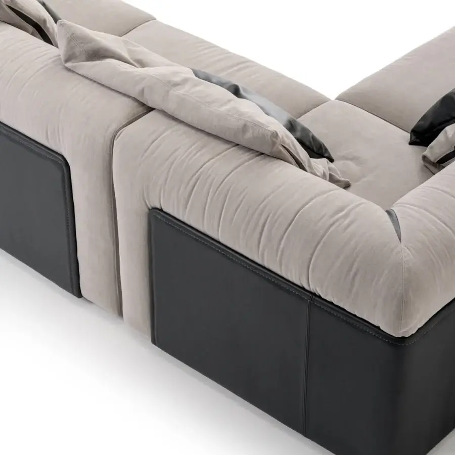 Exceptional Turri Soul sectional in light gray textile with dark cushions and a dark gray base crafted with precious leather inserts