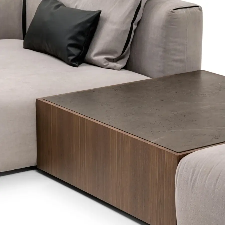 Lavish Turri Soul sectional with light beige textile upholstery and dark brown leather detailing crafted with a matte finish