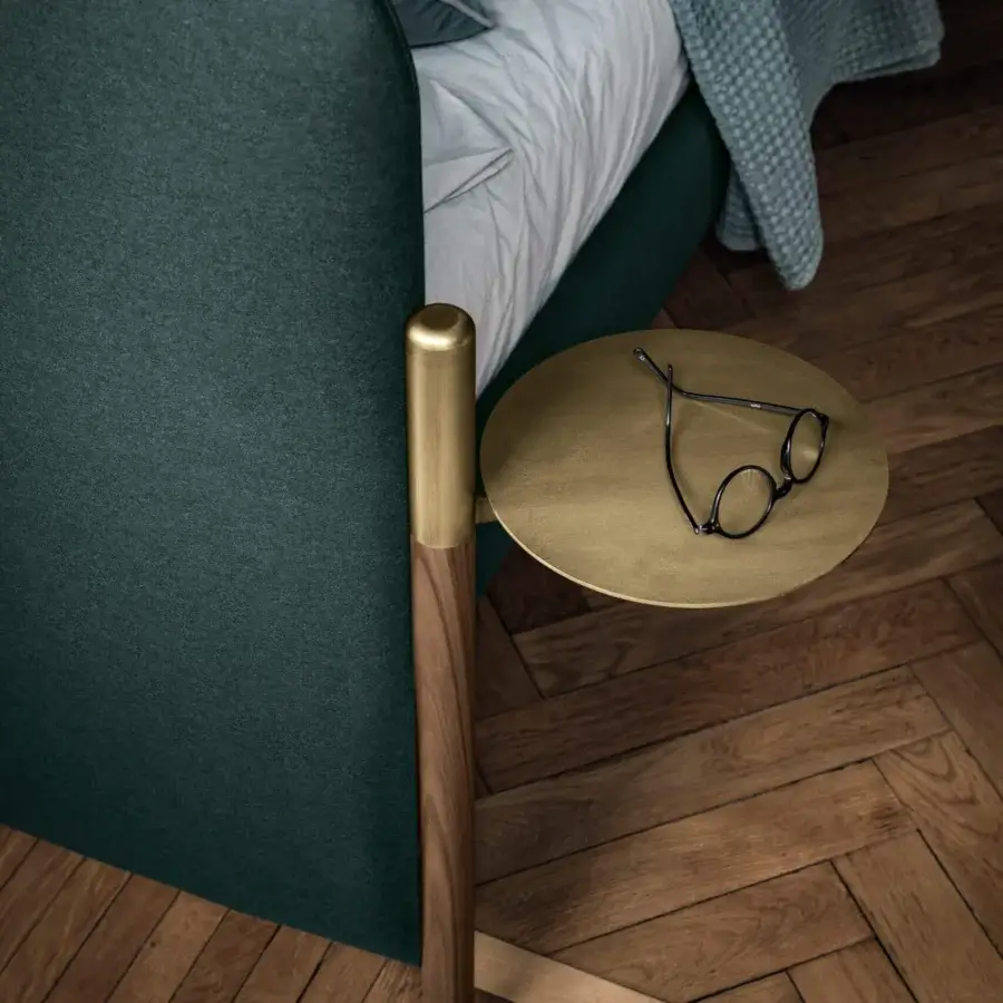 Distinguished Bolzan Letti Flag bed crafted in Italy with dark green textile upholstery and subtle brass accents